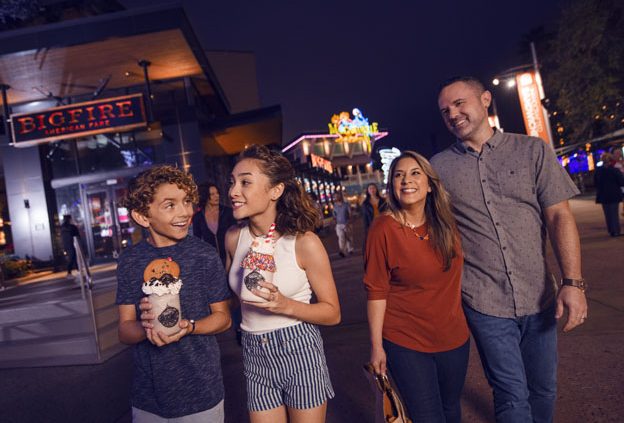 Family walks through Citywalk with Smiles