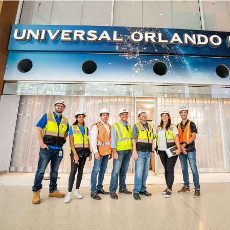 niversal Creative team Members standing outside of a project