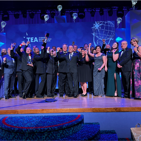 Group of Creative Team Members celebrating a award